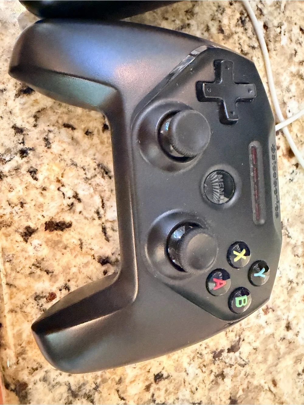 2 steel nimbus controllers and 1 Nintendo switch pro controller